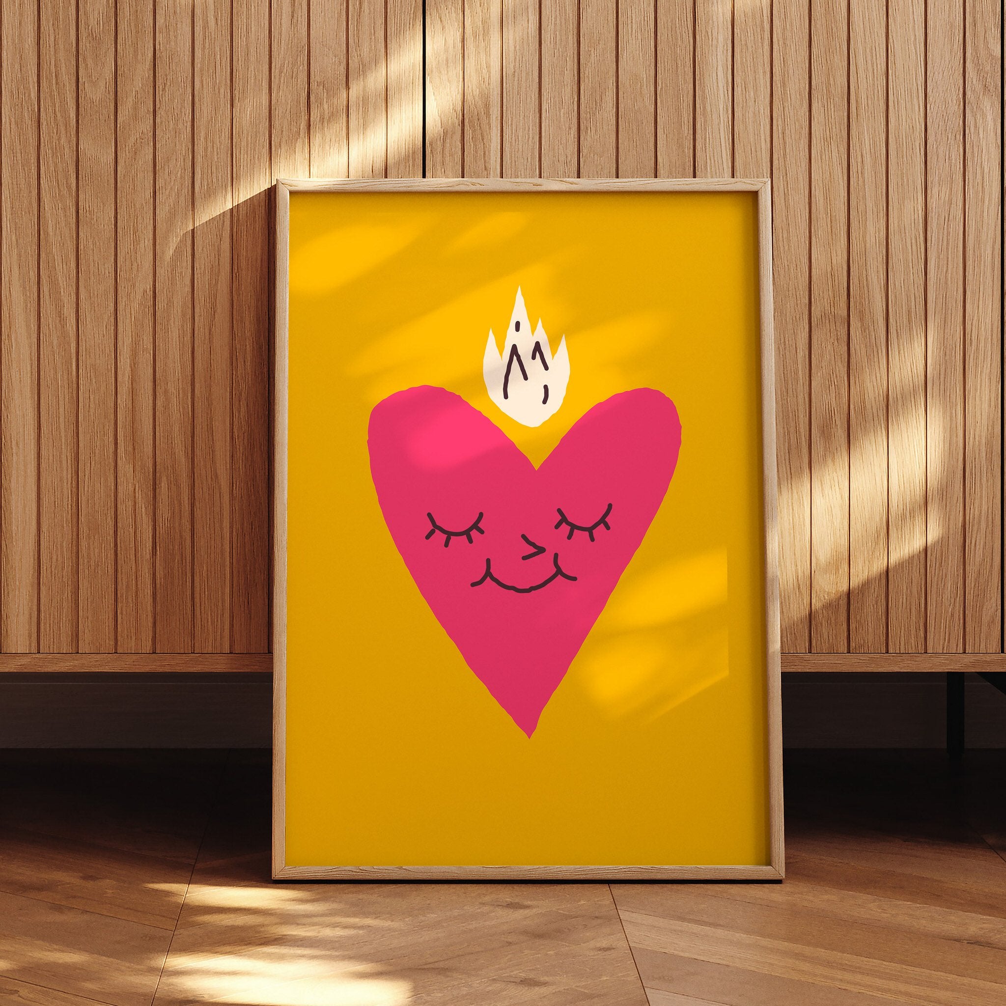 Whimsical poster featuring Flaming Heart with bold flame